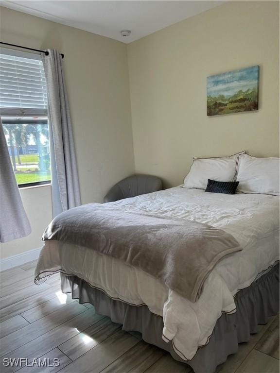 bedroom featuring light hardwood / wood-style floors