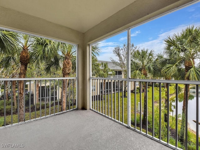 balcony featuring a water view