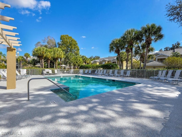 view of swimming pool featuring a patio area