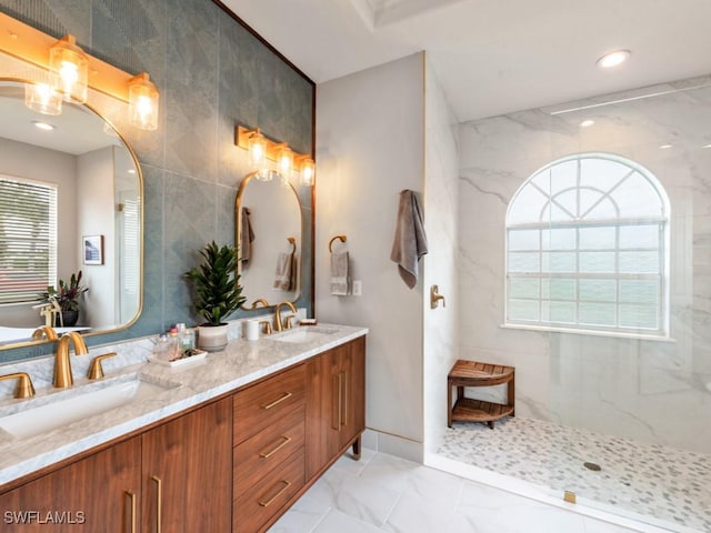 bathroom with vanity and walk in shower