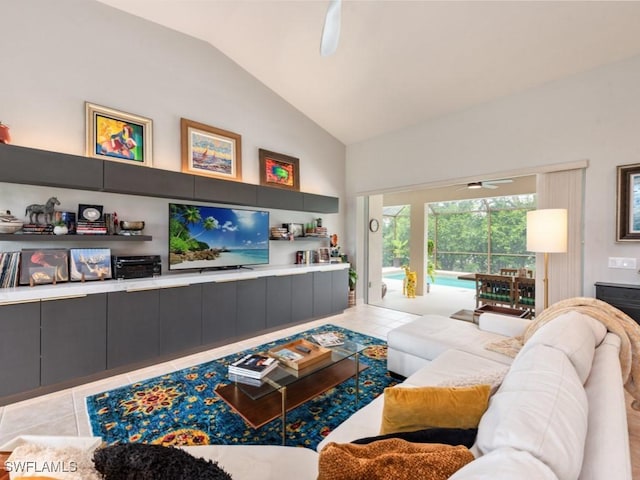 living room featuring lofted ceiling and light tile patterned flooring