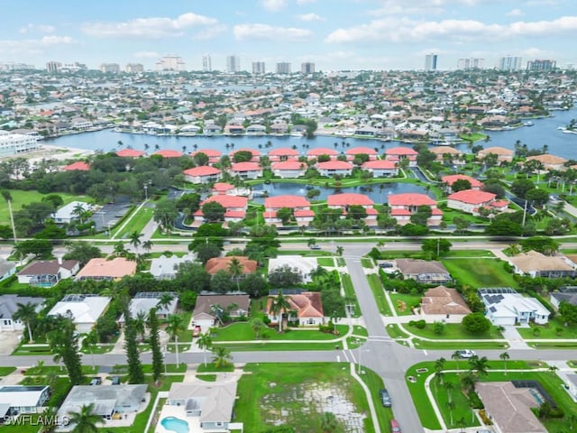 drone / aerial view with a water view