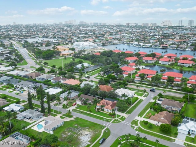 drone / aerial view with a water view