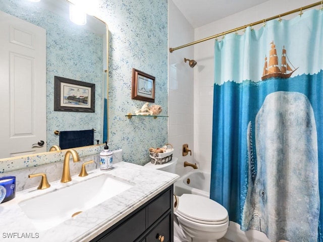 full bathroom featuring shower / bathtub combination with curtain, vanity, a large fireplace, and toilet