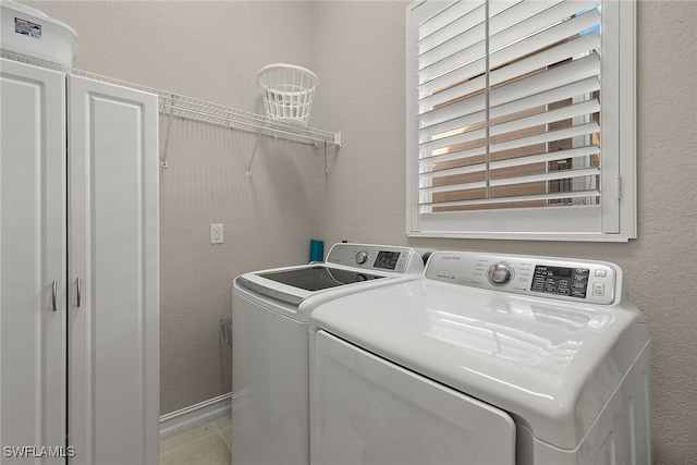 laundry area featuring washer and dryer