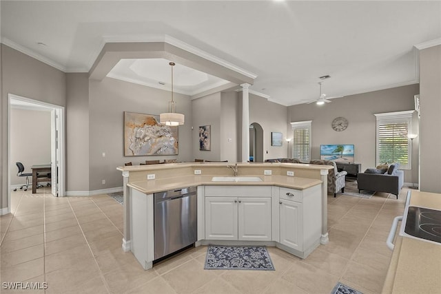 kitchen featuring light tile patterned floors, sink, dishwasher, white cabinetry, and hanging light fixtures