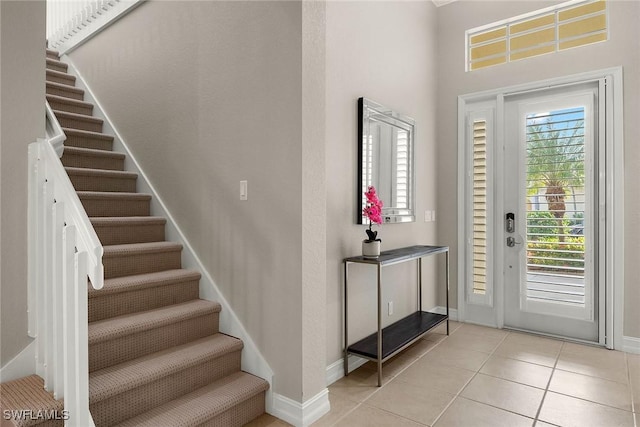 view of tiled foyer entrance