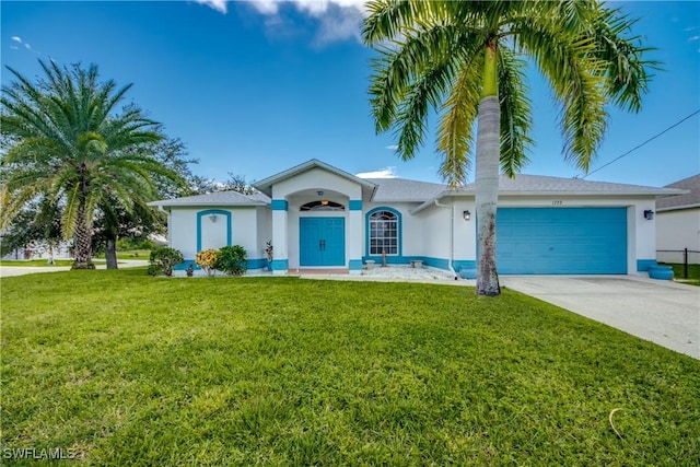 single story home with a garage and a front lawn