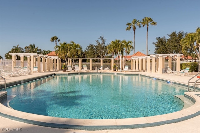 view of swimming pool featuring a patio