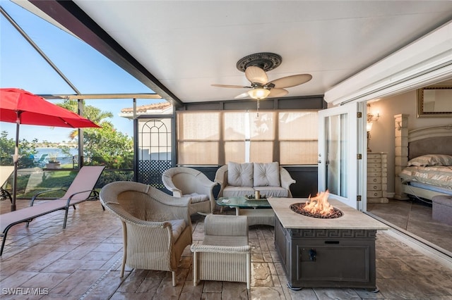 sunroom / solarium with ceiling fan