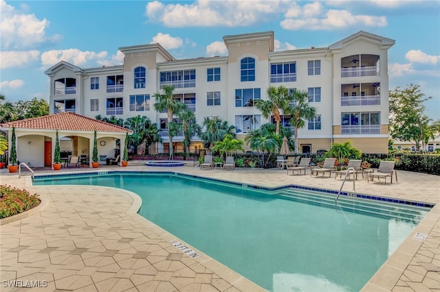 view of swimming pool featuring a patio