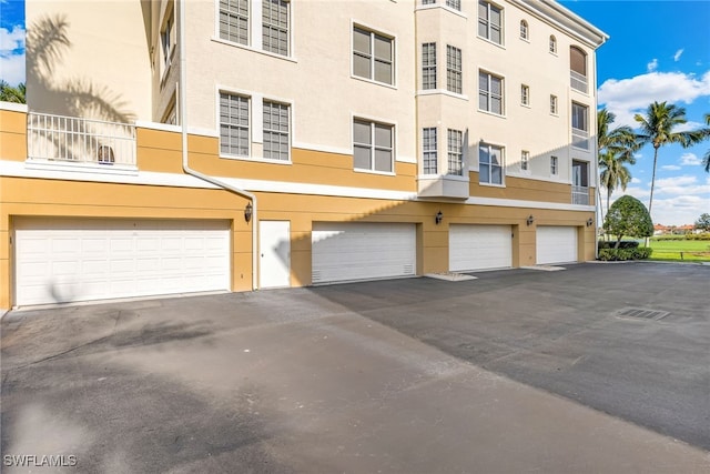 view of building exterior featuring a garage