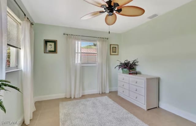 116 Capri Blvd, Naples, FL 34113 - bedroom with baseboards, visible vents, and ceiling fan
