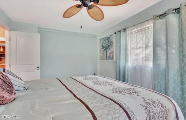 116 Capri Blvd, Naples, FL 34113 - bedroom featuring ceiling fan