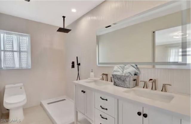 116 Capri Blvd, Naples, FL 34113 - bathroom with walk in shower, toilet, double vanity, and a sink