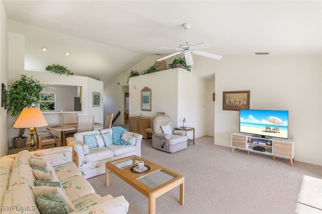 carpeted living room featuring lofted ceiling and ceiling fan