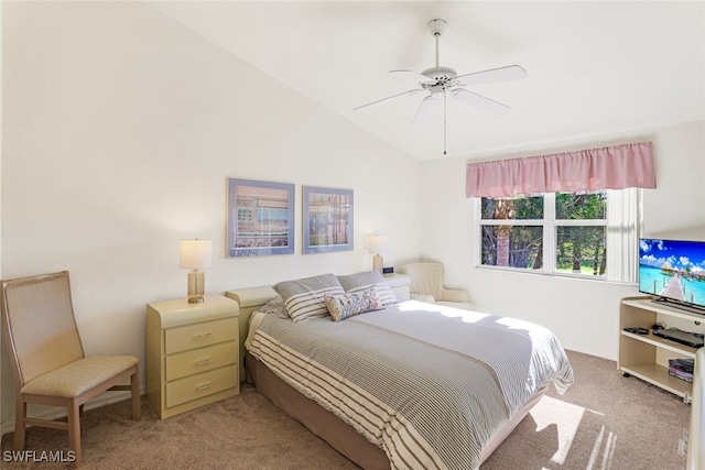 carpeted bedroom featuring ceiling fan and lofted ceiling