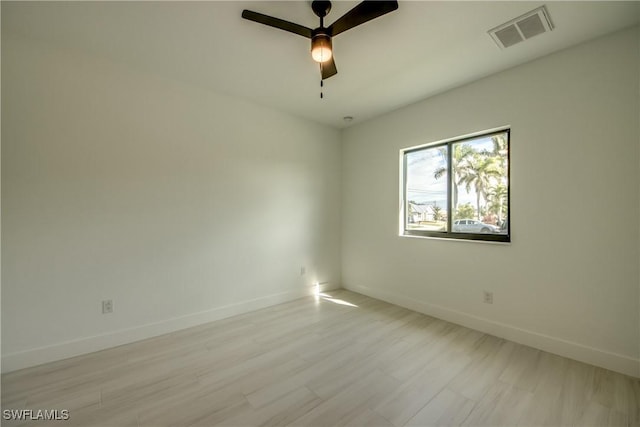 empty room featuring ceiling fan