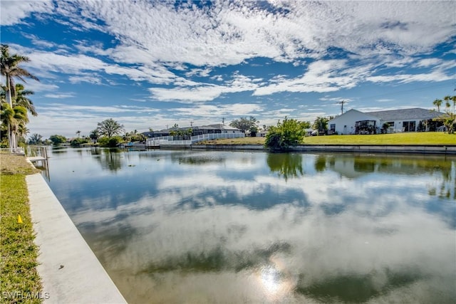 view of water feature with a dock