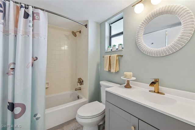 full bathroom featuring shower / tub combo with curtain, vanity, and toilet