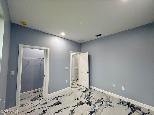 unfurnished bedroom featuring a closet