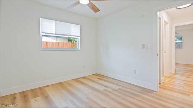 unfurnished room with light hardwood / wood-style flooring and ceiling fan