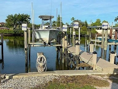 dock area featuring a water view