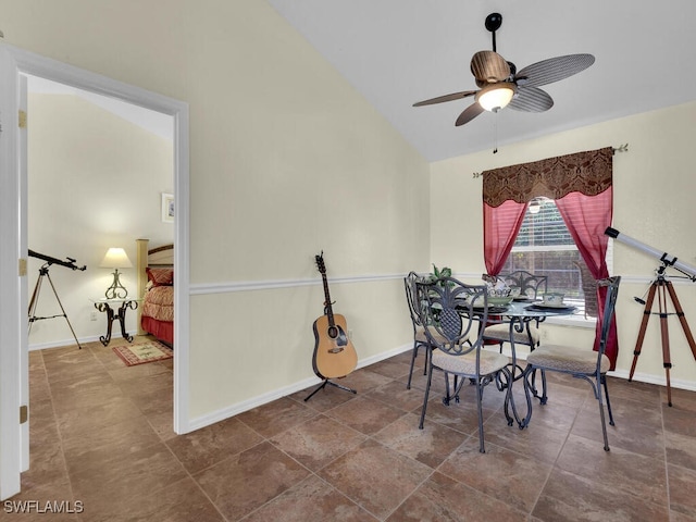 dining space with lofted ceiling and ceiling fan