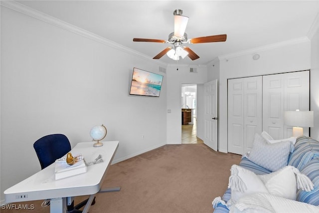 carpeted home office with ornamental molding and ceiling fan