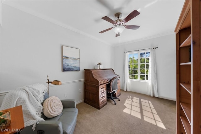 sitting room with crown molding, light carpet, and ceiling fan