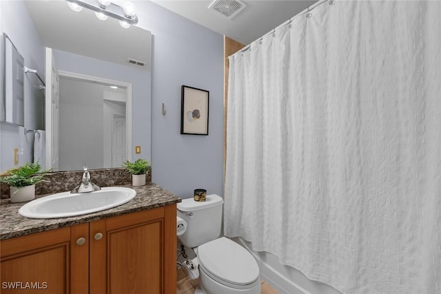 full bathroom featuring shower / bathtub combination with curtain, vanity, toilet, and tile patterned floors