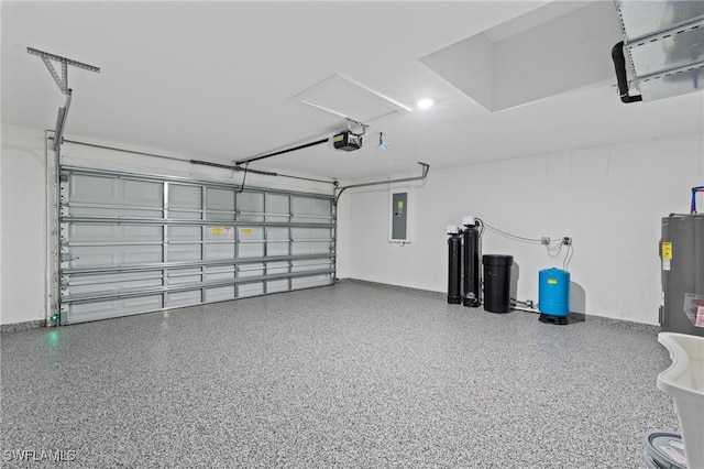 garage featuring a garage door opener, electric panel, and electric water heater