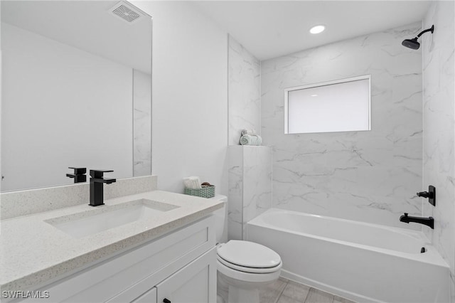 full bathroom with vanity, toilet, and tiled shower / bath combo