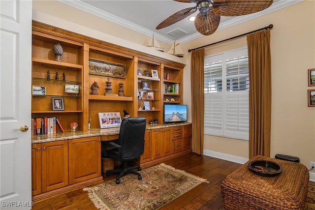 office with built in desk, ornamental molding, dark hardwood / wood-style floors, and ceiling fan