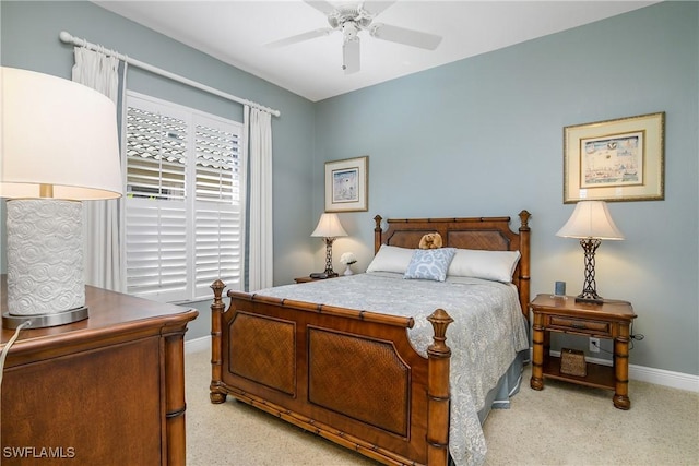 bedroom with light colored carpet and ceiling fan