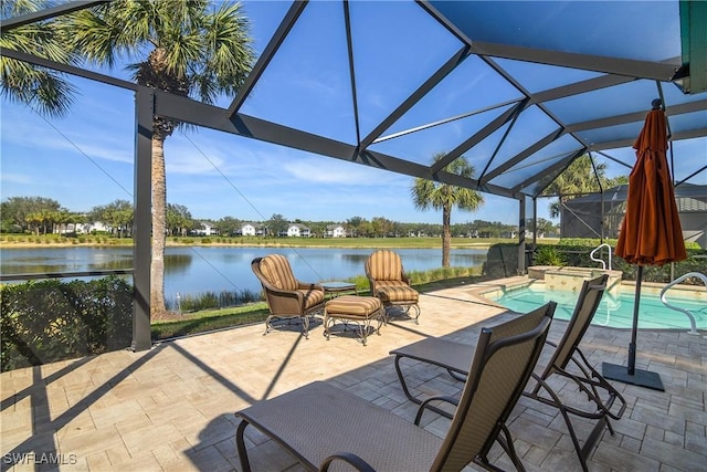 view of patio / terrace featuring a water view, a pool with hot tub, and glass enclosure