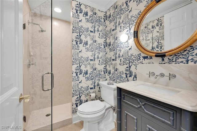 bathroom with a shower with door, ornamental molding, vanity, and toilet