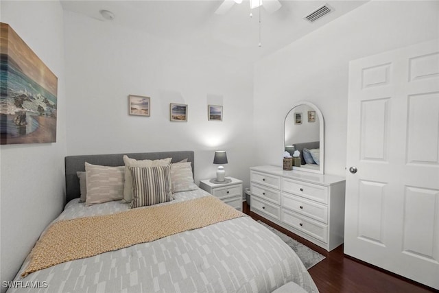 bedroom featuring ceiling fan and dark hardwood / wood-style flooring