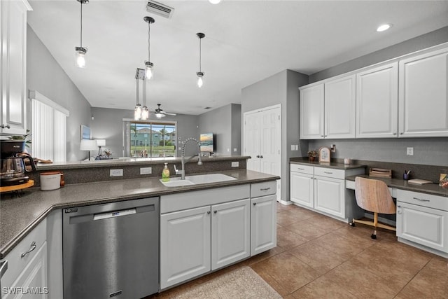 kitchen with pendant lighting, built in desk, white cabinetry, dishwasher, and sink