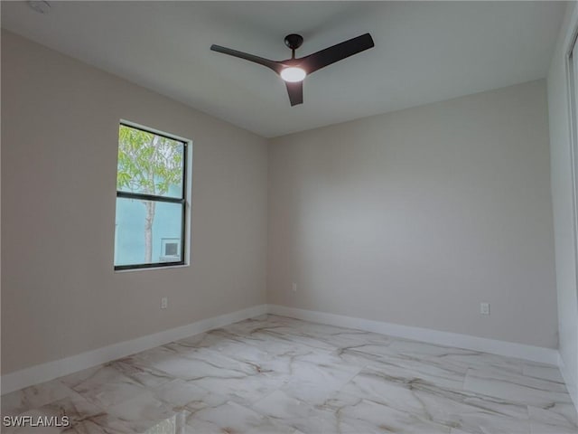 empty room featuring ceiling fan