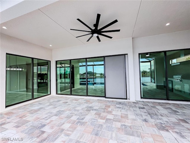 view of patio / terrace with ceiling fan