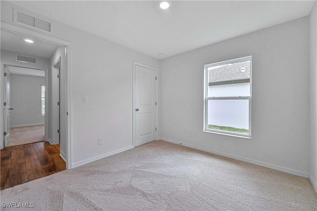 view of carpeted spare room