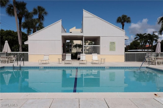 view of swimming pool with a patio area