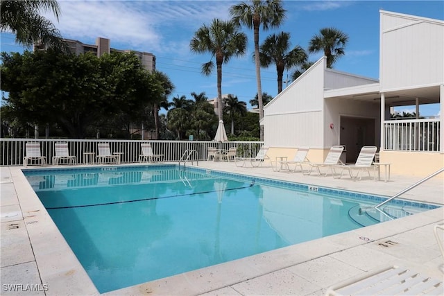 view of swimming pool with a patio area