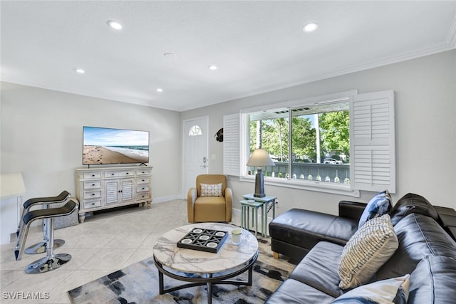 living room with crown molding and light tile patterned floors