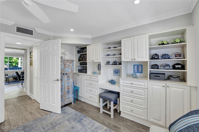 spacious closet with light hardwood / wood-style floors