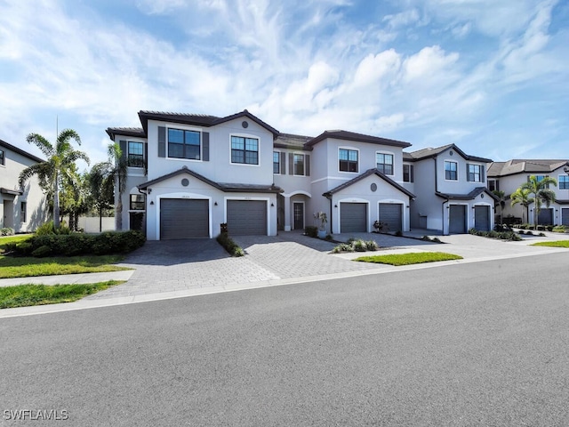 view of front of home with a garage