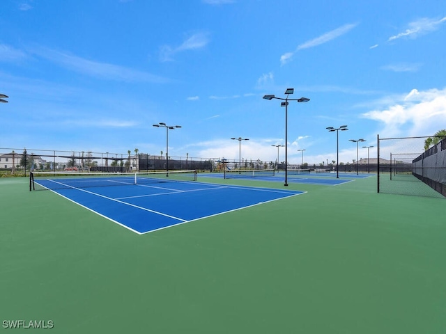 view of sport court with basketball hoop