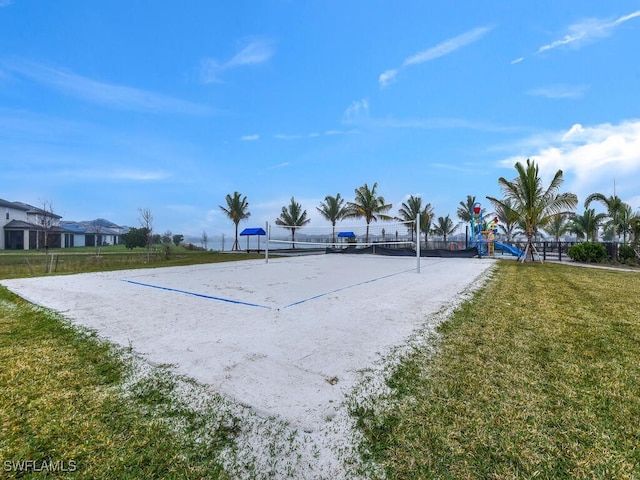 view of home's community with a playground, a lawn, and volleyball court