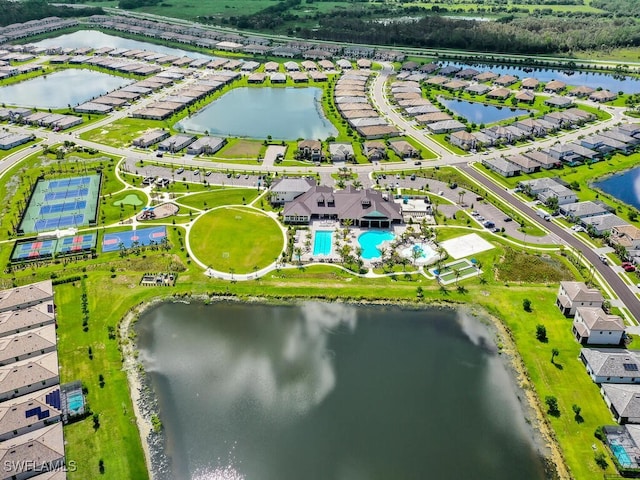 birds eye view of property featuring a water view